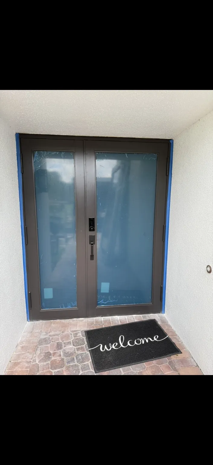 Completed frosted glass impact entry door