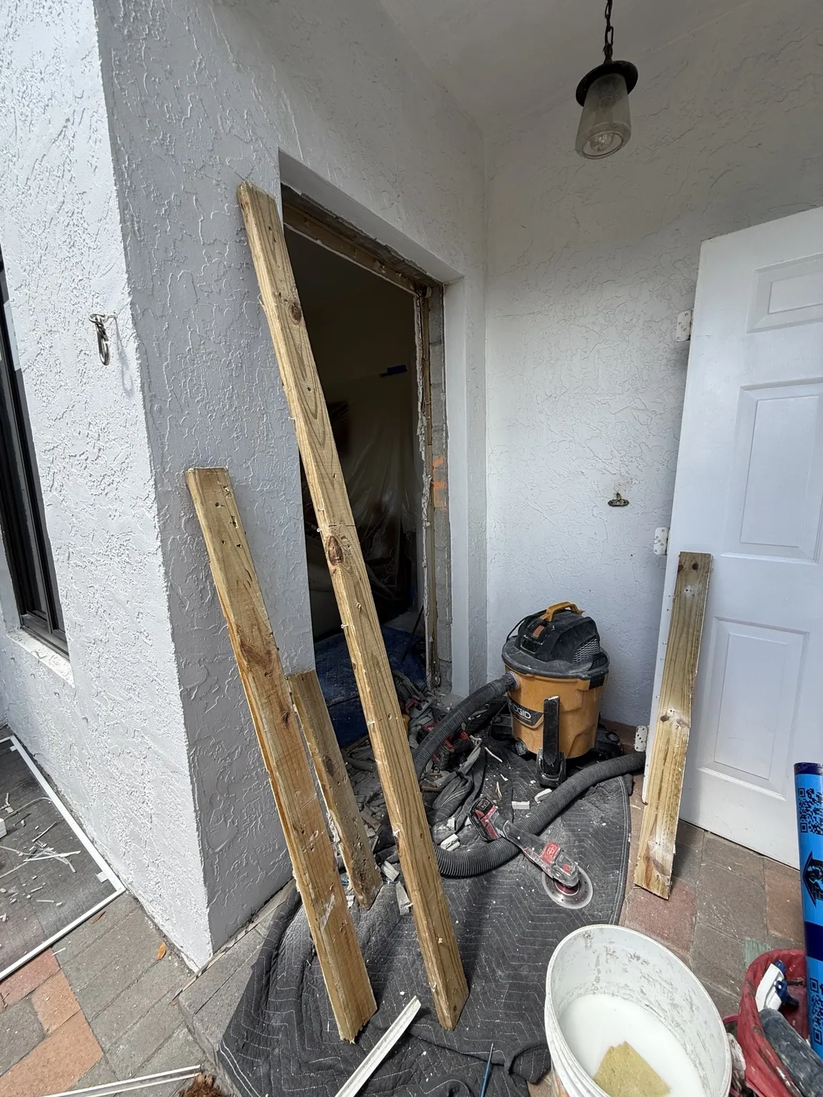 Door opening prepared for a new impact-rated unit